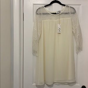 Va Va by Joy Han. Ivory dress. Fringed sleeves!